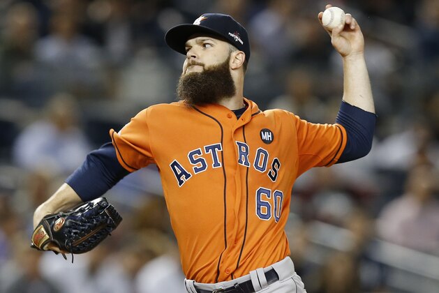 Houston Astros starting pitcher Dallas Keuchel pitches in the first inning of the American League wild card baseball game against the New York Yankees at Yankee Stadium in New York, Tuesday, Oct. 6, 2015.  (AP Photo/Kathy Willens)