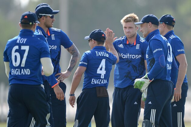 ABU DHABI, UNITED ARAB EMIRATES - NOVEMBER 08: David Willey of England celebrates with teammates after dismissing Anshuman Rath of Hong Kong during the tour match between Hong Kong and England at Zayed Cricket Stadium Nursery Ground on November 8, 2015 in Abu Dhabi, United Arab Emirates. (Photo by Gareth Copley/Getty Images) ABU DHABI, UNITED ARAB EMIRATES - NOVEMBER 08: David Willey of England celebrates with teammates after dismissing Anshuman Rath of Hong Kong during the tour match between Hong Kong and England at Zayed Cricket Stadium Nursery Ground on November 8, 2015 in Abu Dhabi, United Arab Emirates. (Photo by Gareth Copley/Getty Images)