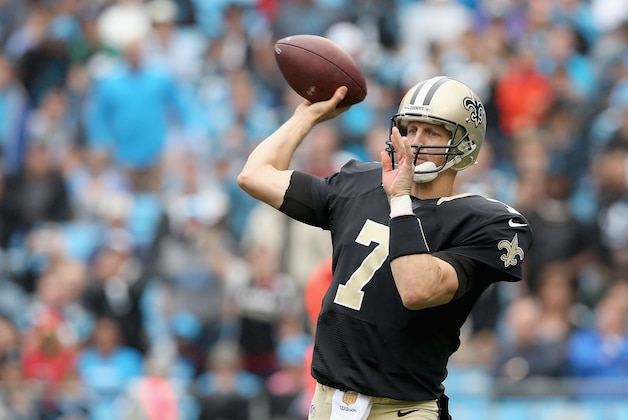CHARLOTTE, NC - SEPTEMBER 27:  Luke McCown #7 of the New Orleans Saints throws a pass against the Carolina Panthers in the second half during their game at Bank of America Stadium on September 27, 2015 in Charlotte, North Carolina.  (Photo by Streeter Lecka/Getty Images)
