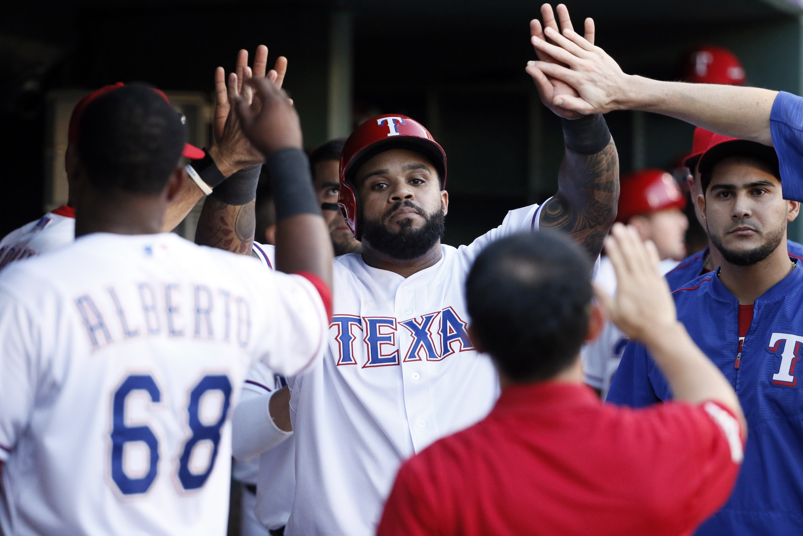 Texas Rangers designated hitter Prince Fielder (84) celebrates scoring against the Toronto Blue Jays with with teammates during the eighth inning in Game 4 of baseball's American League Division Series Monday, Oct. 12, 2015, in Arlington, Texas. (AP Photo/Tony Gutierrez) Texas Rangers designated hitter Prince Fielder (84) celebrates scoring against the Toronto Blue Jays with with teammates during the eighth inning in Game 4 of baseball's American League Division Series Monday, Oct. 12, 2015, in Arlington, Texas. (AP Photo/Tony Gutierrez)