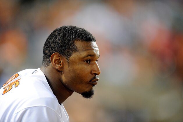 BALTIMORE, MD - SEPTEMBER 15:  Adam Jones #10 of the Baltimore Orioles watches the game against the Boston Red Sox at Oriole Park at Camden Yards on September 15, 2015 in Baltimore, Maryland.  (Photo by G Fiume/Getty Images)