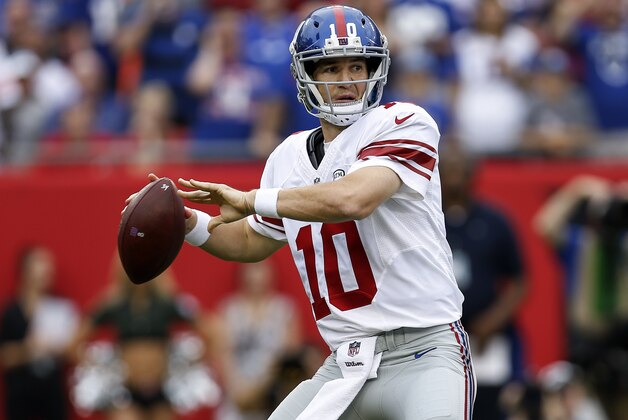 TAMPA, FL - NOVEMBER 8: Quarterback Eli Manning #10 of the New York Giants on a pass play during the game against the Tampa Bay Buccaneers at Raymond James Stadium on November 8, 2015 in Tampa, Florida. The Giants defeated the Buccaneers 32 to 18. (Photo by Don Juan Moore/Getty Images)
