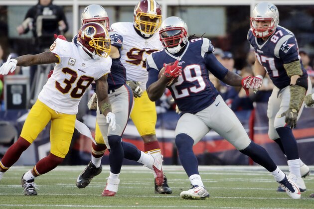 Washington Redskins safety Dashon Goldson (38) pursues New England Patriots running back LeGarrette Blount (29) during the second half of an NFL football game, Sunday, Nov. 8, 2015, in Foxborough, Mass. (AP Photo/Steven Senne)