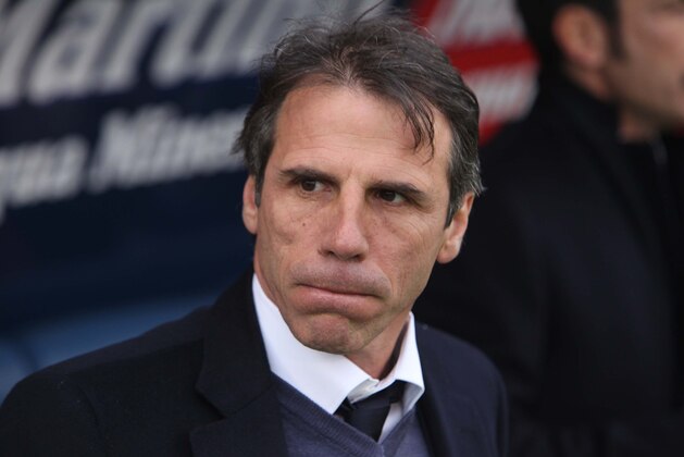 Cagliari coach Gianfranco Zola waits for the kick-off of a Serie A soccer match between Cagliari and Roma, in Cagliari, Italy, Sunday, Feb. 8, 2015. (AP Photo/Daniela Santoni)