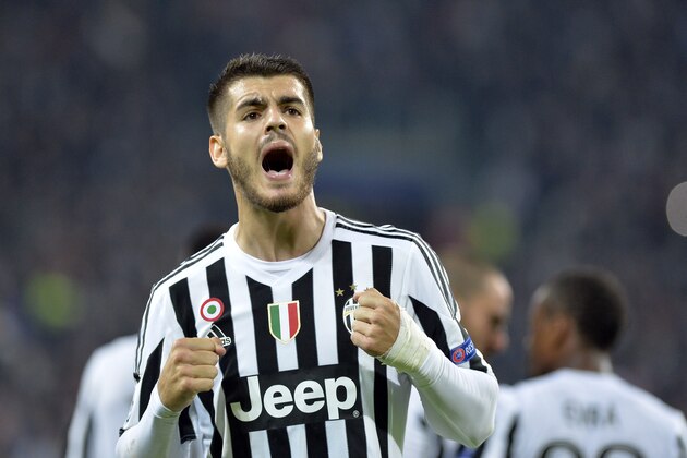 Juventus Alvaro Morata celebrates after he scored during the Champions League group D soccer match between Juventus and FC Sevilla, at the Juventus Stadium in Turin, Italy, Wednesday, Sept. 30, 2015. (AP Photo/Massimo Pinca)