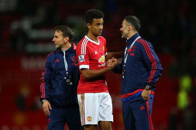 MANCHESTER, ENGLAND - NOVEMBER 07: Cameron Borthwick-Jackson (C) shakes hands with assistant manager Ryan Giggs (R) after their team's 2-0 win in  the Barclays Premier League match between Manchester United and West Bromwich Albion at Old Trafford on November 7, 2015 in Manchester, England.  (Photo by Alex Livesey/Getty Images)