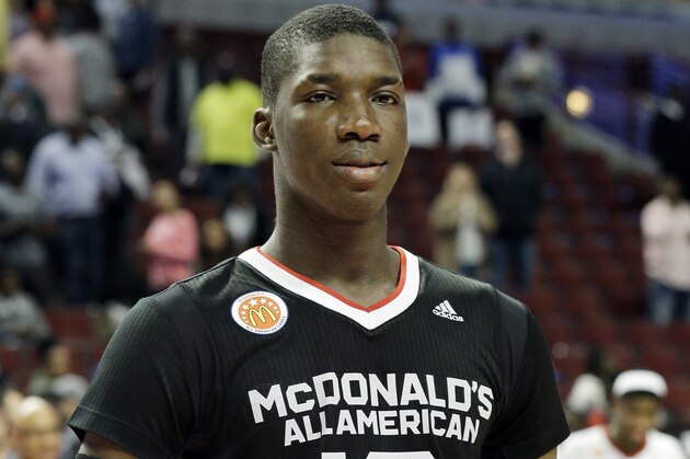 East orward Cheick Diallo of Our Savior New American in Centereach, NY., holds the MVP trophy after East defeated West 111-91 in the McDonald's All-American boys basketball game in Chicago on Wednesday, April 1, 2015. (AP Photo/Nam Y. Huh)