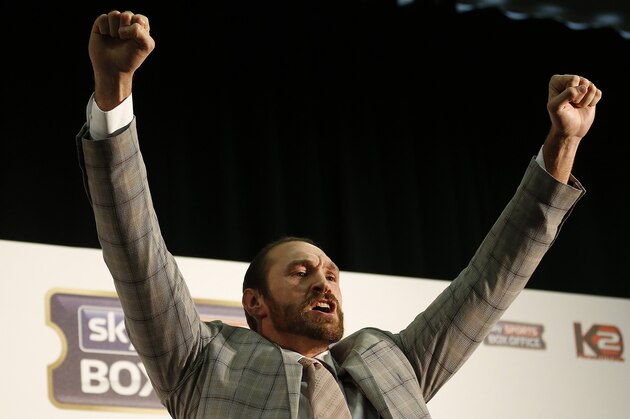 British heavyweight Tyson Fury poses for photographers during a press conference for the heavyweight title bout against WBA, WBO, IBF, and IBO heavyweight boxer, Wladimir Klitschko on October 24,2015 in Duesseldorf, Germany, in London, Wednesday, Sept. 23, 2015.(AP Photo/Frank Augstein)