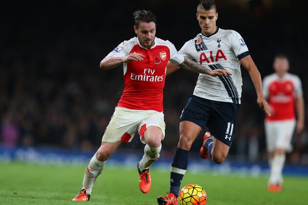 LONDON, ENGLAND - NOVEMBER 08:  Mathieu Debuchy of Arsenal and Erik Lamela of Tottenham Hotspur during the Barclays Premier League match between Arsenal and Tottenham Hotspur at Emirates Stadium on November 8, 2015 in London, England.  (Photo by Catherine Ivill - AMA/Getty Images)