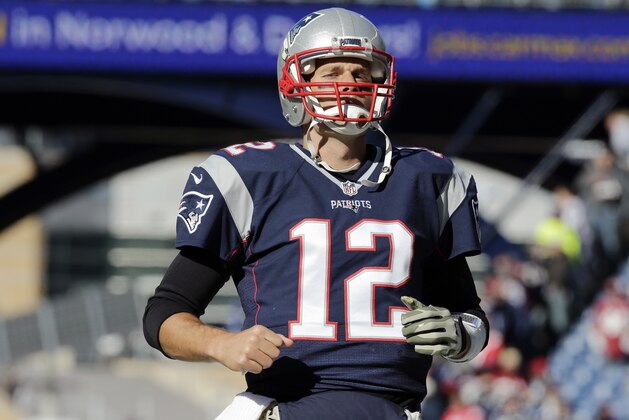 New England Patriots quarterback Tom Brady takes the field to warm up before an NFL football game between the Patriots and the Washington Redskins, Sunday, Nov. 8, 2015, in Foxborough, Mass. (AP Photo/Charles Krupa)