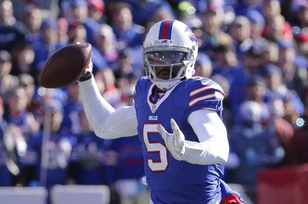 Buffalo Bills quarterback Tyrod Taylor (5) runs against the Miami Dolphins during the first half of an NFL football game Sunday, Nov. 8, 2015, in Orchard Park, N.Y. (AP Photo/Bill Wippert)