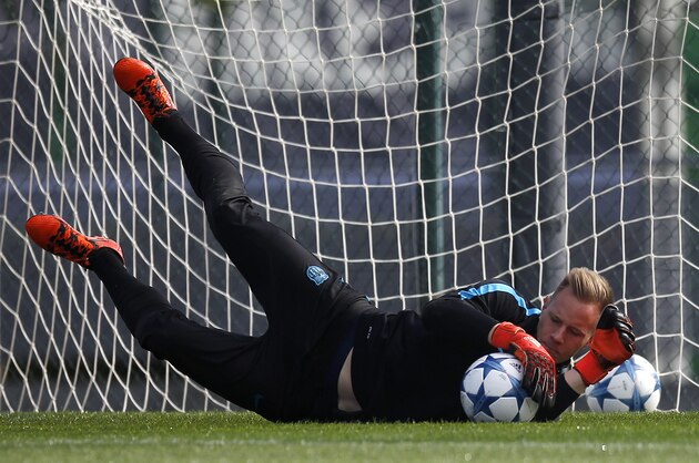 FC Barcelona's goalkeeper Marc-Andre ter Stegen, saves the ball during a training session at the Sports Center FC Barcelona Joan Gamper in San Joan Despi, Spain, Tuesday, Nov. 3, 2015. FC Barcelona will play against BATE Borisov in a Champions League Group E soccer match on Wednesday. (AP Photo/Manu Fernandez)