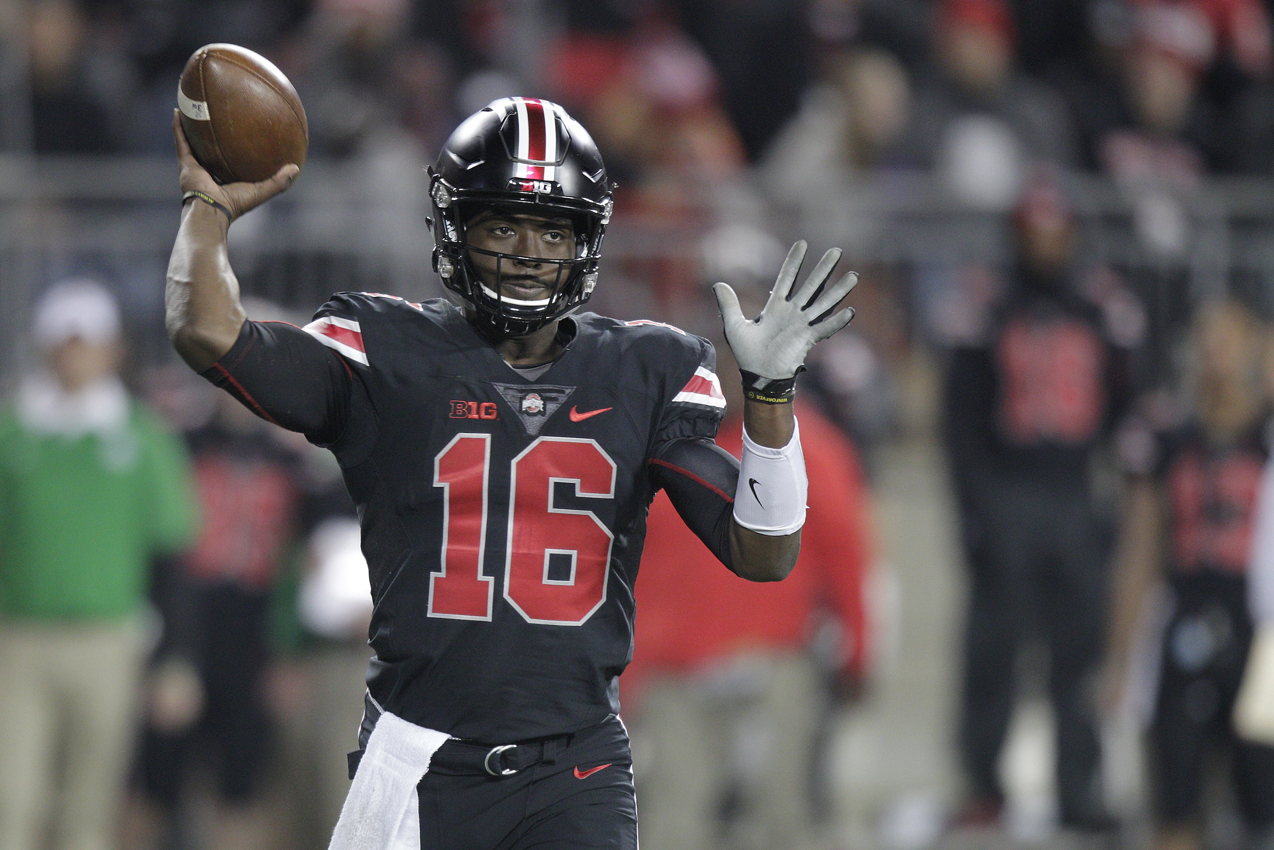 Ohio State quarterback J.T. Barrett plays against Penn State during an NCAA college football game Saturday, Oct. 17, 2015, in Columbus, Ohio. (AP Photo/Jay LaPrete) Ohio State quarterback J.T. Barrett plays against Penn State during an NCAA college football game Saturday, Oct. 17, 2015, in Columbus, Ohio. (AP Photo/Jay LaPrete)