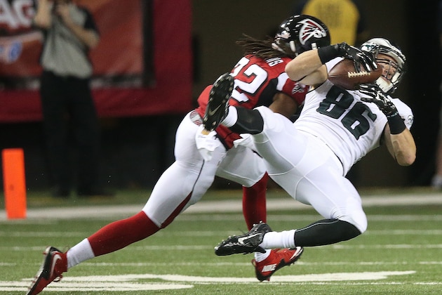 Philadelphia Eagles tight end Zach Ertz (86) makes the catch against Atlanta Falcons cornerback Jalen Collins (32) during the second half of an NFL football game, Monday, Sept. 14, 2015, in Atlanta. (AP Photo/John Bazemore)