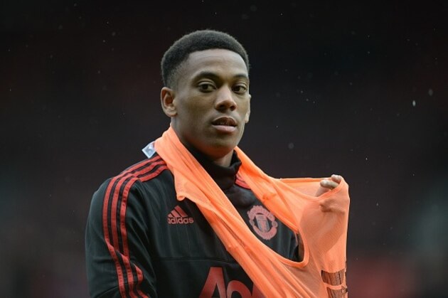 Manchester United's French striker Anthony Martial is pictured during warm-up ahead of the English Premier League football match between Manchester United and West Bromwich Albion at Old Trafford in Manchester, north west England, on November 7, 2015. AFP PHOTO / OLI SCARFF

RESTRICTED TO EDITORIAL USE. No use with unauthorized audio, video, data, fixture lists, club/league logos or 'live' services. Online in-match use limited to 75 images, no video emulation. No use in betting, games or single club/league/player publications.        (Photo credit should read OLI SCARFF/AFP/Getty Images)
