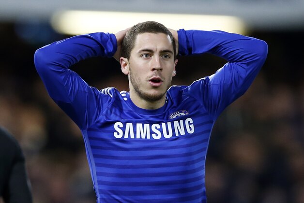 Chelsea's Eden Hazard looks up after failing to score during the English League Cup semifinal second leg soccer match between Chelsea and Liverpool at Stamford Bridge stadium in London, Tuesday, Jan. 27, 2015. (AP Photo/Alastair Grant)