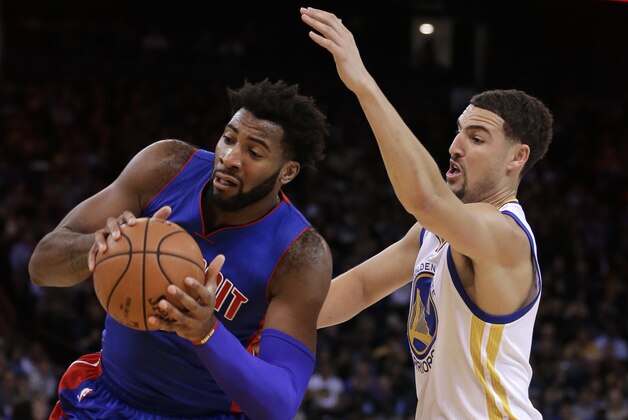 Golden State Warriors' Klay Thompson, right, defends against Detroit Pistons' Andre Drummond during the first half of an NBA basketball game Monday, Nov. 9, 2015, in Oakland, Calif. (AP Photo/Ben Margot)