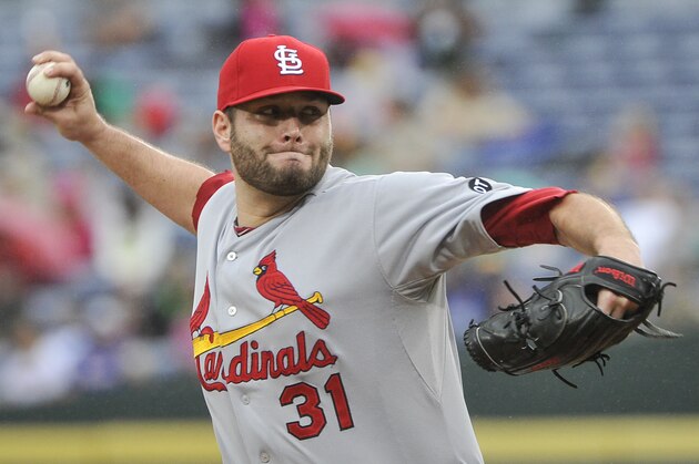 St. Louis Cardinals' Lance Lynn pitches against the Atlanta Braves during the first inning of the second baseball game of a doubleheader, Sunday, Oct. 4, 2015, in Atlanta. (AP Photo/John Amis)