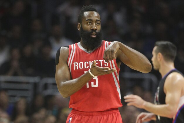 Houston Rockets' James Harden gestures after making a basket during the first half of an NBA basketball game against the Los Angeles Clippers, Saturday, Nov. 7, 2015, in Los Angeles. (AP Photo/Jae C. Hong)