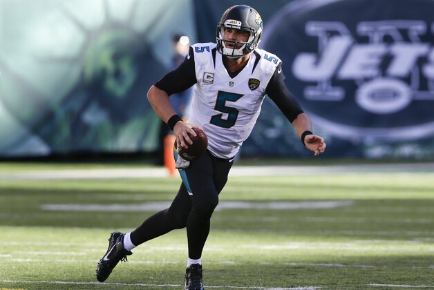Jacksonville Jaguars quarterback Blake Bortles (5) runs the ball against the New York Jets during the second quarter of an NFL football game, Sunday, Nov. 8, 2015, in East Rutherford, N.J. (AP Photo/Seth Wenig)