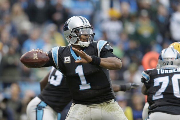 Carolina Panthers' Cam Newton (1) aims a pass against the Green Bay Packers during the second half of an NFL football game in Charlotte, N.C., Sunday, Nov. 8, 2015. The Panthers won 37-29. (AP Photo/Bob Leverone) Carolina Panthers' Cam Newton (1) aims a pass against the Green Bay Packers during the second half of an NFL football game in Charlotte, N.C., Sunday, Nov. 8, 2015. The Panthers won 37-29. (AP Photo/Bob Leverone)