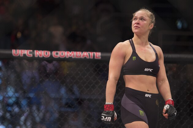 RIO DE JANEIRO, BRAZIL - AUGUST 01:  UFC women's bantamweight champion Ronda Rousey celebrates after defeating Bethe Correia of Brazil by KO during the UFC 190 event inside HSBC Arena on August 1, 2015 in Rio de Janeiro, Brazil.  (Photo by Jeff Bottari/Zuffa LLC/Zuffa LLC via Getty Images)
