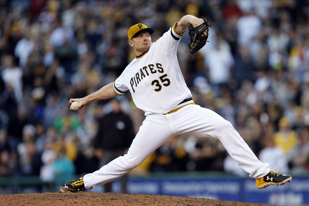 Pittsburgh Pirates relief pitcher Mark Melancon throws against the Cincinnati Reds in the ninth inning of a baseball game, Sunday, Oct. 4, 2015, in Pittsburgh. The Pirates won 4-0 and clenched the home field for their upcoming wild-card playoff game against the Chicago Cubs. (AP Photo/Keith Srakocic)