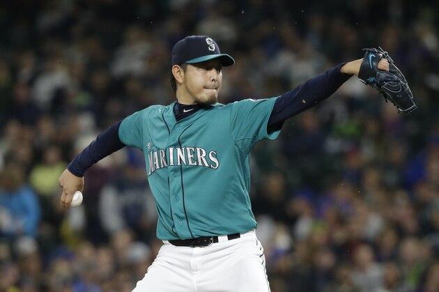 Seattle Mariners starting pitcher Hisashi Iwakuma in action against the Oakland Athletics in a baseball game Friday, Oct. 2, 2015, in Seattle. (AP Photo/Elaine Thompson) Seattle Mariners starting pitcher Hisashi Iwakuma in action against the Oakland Athletics in a baseball game Friday, Oct. 2, 2015, in Seattle. (AP Photo/Elaine Thompson)