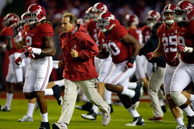 TUSCALOOSA, AL - NOVEMBER 07:  Nick Saban, head coach of the Alabama Crimson Tide, runs onto the field before playing against the LSU Tigers at Bryant-Denny Stadium on November 7, 2015 in Tuscaloosa, Alabama.  (Photo by Kevin C. Cox/Getty Images)