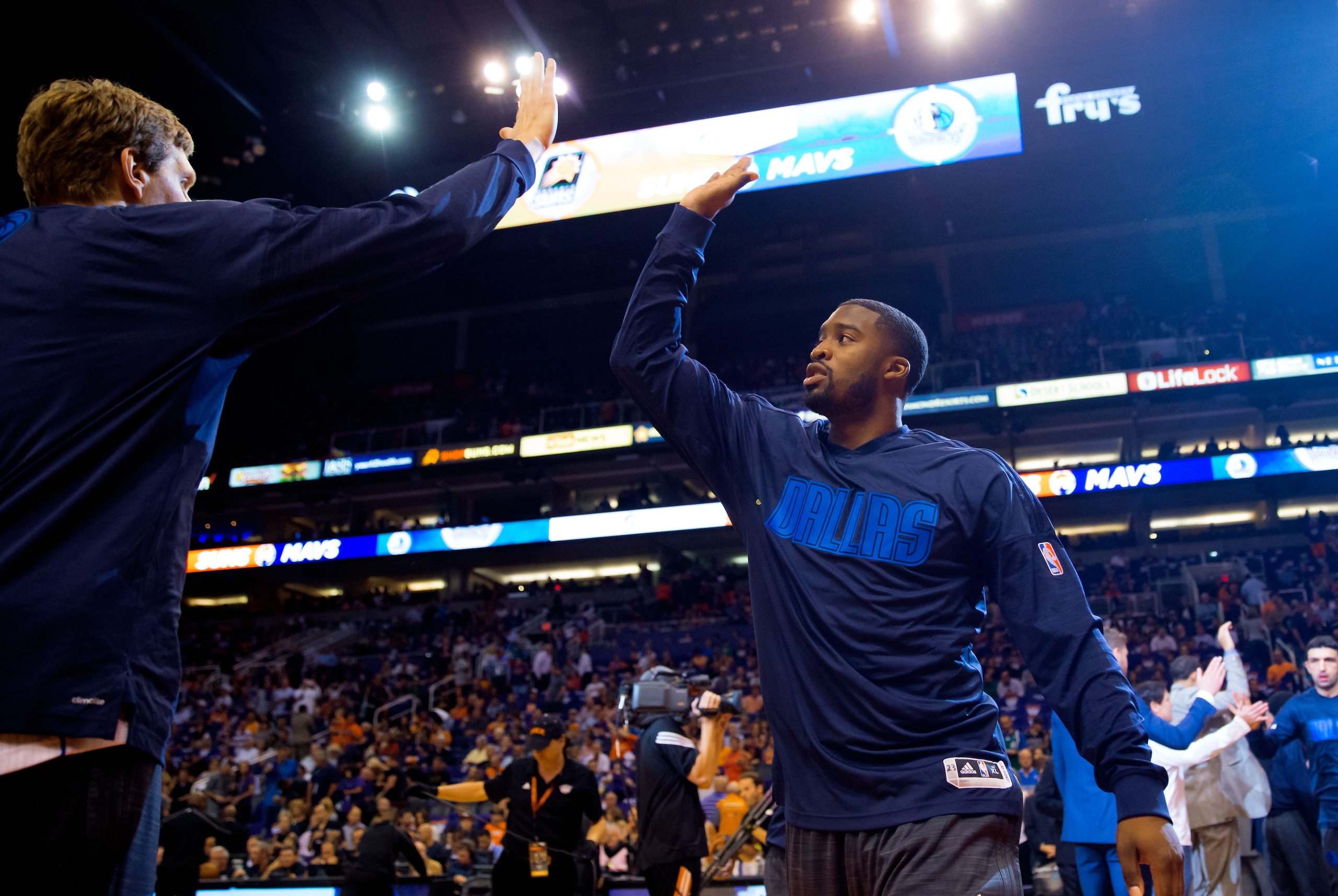 Oct 28, 2015; Phoenix, AZ, USA; Dallas Mavericks guard Wesley Matthews (23) greets teammates prior to the game against the Phoenix Suns in the season opener at Talking Stick Resort Arena. Mandatory Credit: Mark J. Rebilas-USA TODAY Sports Oct 28, 2015; Phoenix, AZ, USA; Dallas Mavericks guard Wesley Matthews (23) greets teammates prior to the game against the Phoenix Suns in the season opener at Talking Stick Resort Arena. Mandatory Credit: Mark J. Rebilas-USA TODAY Sports