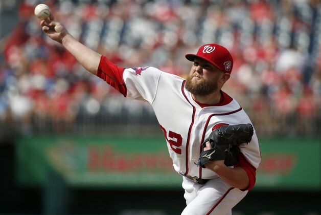 Washington Nationals relief pitcher Drew Storen (22) throws during a baseball game against the Miami Marlins at Nationals Park, Sunday, Aug. 30, 2015, in Washington.  The Nationals won 7-4. (AP Photo/Alex Brandon)