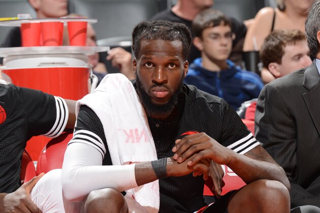 TORONTO, CANADA - October 12 :  DeMarre Carroll #5 of the Toronto Raptors looks on from the bench against the Minnesota Timberwolves during a preseason game on October 12, 2015 at the Air Canada Centre in Toronto, Ontario, Canada.  NOTE TO USER: User expressly acknowledges and agrees that, by downloading and or using this Photograph, user is consenting to the terms and conditions of the Getty Images License Agreement.  Mandatory Copyright Notice: Copyright 2015 NBAE (Photo by Ron Turenne/NBAE via Getty Images)