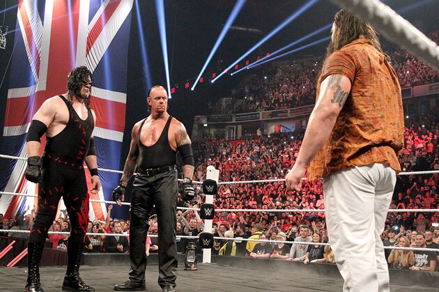 Undertaker and Kane stare down Bray Wyatt