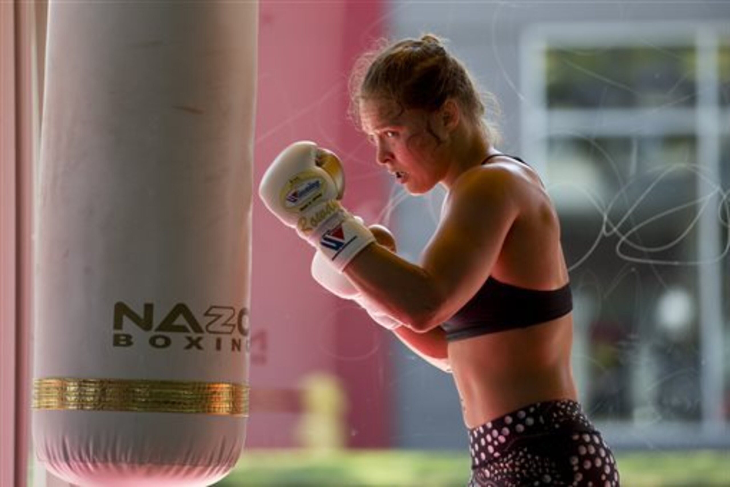 Mixed martial arts fighter Ronda Rousey works out at Glendale Fighting Club, Wednesday, July 15, 2015, in Glendale, Calif. Rousey, the UFC bantamweight champion, will return to the octagon against Brazil’s unbeaten Bethe Correia at UFC 190 in Rio de Janeiro on Aug. 1. (AP Photo/Jae C. Hong)