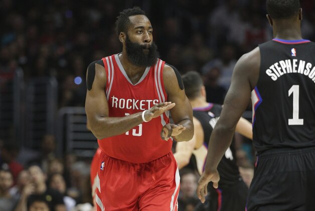 Houston Rockets' James Harden reacts after making a basket during the first half of an NBA basketball game against the Los Angeles Clippers, Saturday, Nov. 7, 2015, in Los Angeles. (AP Photo/Jae C. Hong)