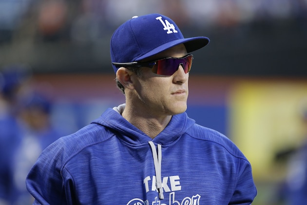 Los Angeles Dodgers' Chase Utley walks onto the field for batting practice before the start of baseball's Game 4 of the National League Division Series against the New York Mets, Tuesday, Oct. 13, 2015, in New York. (AP Photo/Frank Franklin II)