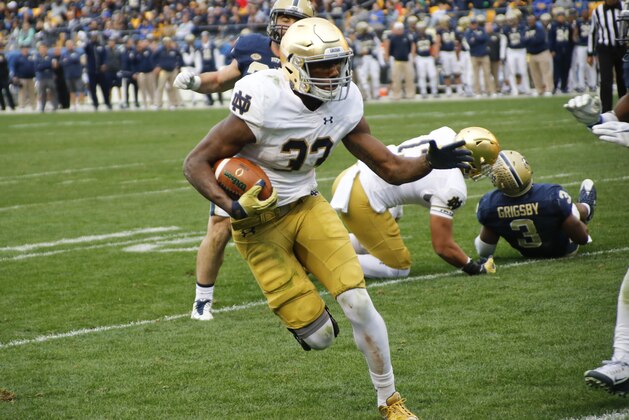 Notre Dame running back Josh Adams (33) plays in an NCAA football game between the Pittsburgh and Notre Dame, Saturday, Nov. 7, 2015 in Pittsburgh. (AP Photo/Keith Srakocic)