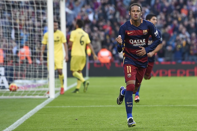 Barcelona's Brazilian forward Neymar da Silva Santos Junior celebrates his goal during the Spanish league football match FC Barcelona vs Villarreal CF at the Camp Nou stadium in Barcelona on November 8, 2015.   AFP PHOTO/ JOSEP LAGO        (Photo credit should read JOSEP LAGO/AFP/Getty Images)