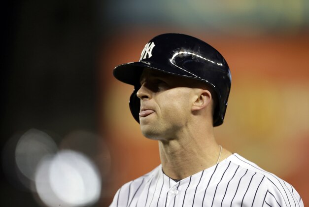 Oct 6, 2015; Bronx, NY, USA; New York Yankees center fielder Brett Gardner (11) reacts after grounding out against the Houston Astros during the eighth inning in the American League Wild Card playoff baseball game at Yankee Stadium. Mandatory Credit: Adam Hunger-USA TODAY Sports