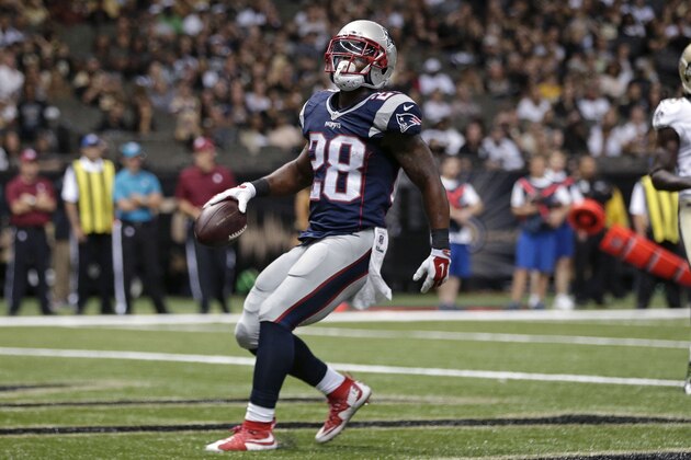 New England Patriots running back James White (28) carries into the end zone for a touchdown in the second half of an NFL football game in New Orleans, Saturday, Aug. 22, 2015. (AP Photo/Brynn Anderson)