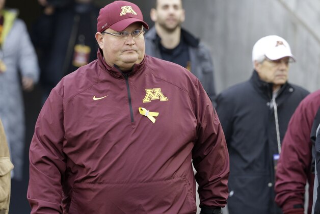 Minnesota acting head coach Tracy Claeys before the first quarter of an NCAA college football game against Penn State in Minneapolis Saturday, Nov. 9, 2013. (AP Photo/Ann Heisenfelt)
