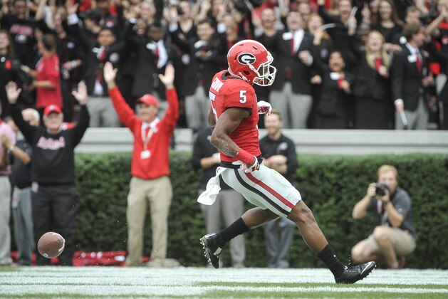Georgia wide receiver Terry Godwin (5) scores a touchdown against Kentucky during the first half of an NCAA college football game, Saturday, Nov. 7, 2015, in Athens, Ga. Georgia won 27-3. (AP Photo/John Amis)