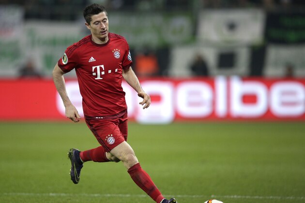 Bayern's Robert Lewandowski plays the ball during the German soccer cup 2nd round match between VfL Wolfsburg and FC Bayern Munich in Wolfsburg, Germany, Tuesday, Oct. 27, 2015. (AP Photo/Michael Sohn)