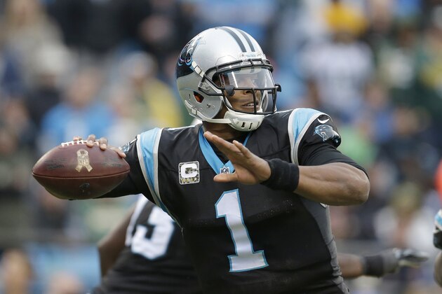Carolina Panthers' Cam Newton (1) aims a pass against the Green Bay Packers during the second half of an NFL football game in Charlotte, N.C., Sunday, Nov. 8, 2015. The Panthers won 37-29. (AP Photo/Bob Leverone)