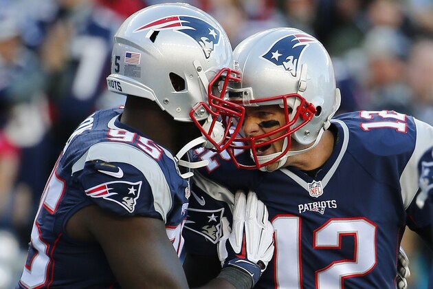 New England Patriots quarterback Tom Brady celebrates with defensive end Chandler Jones during a NFL football game against the Washington Redskins at Gillette Stadium in Foxborough, Mass. Sunday Nov. 8, 2015. (Winslow Townson/AP Images for Panini)