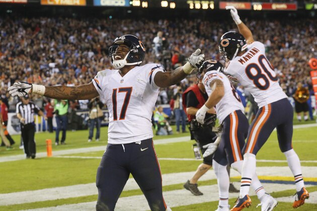Chicago Bears wide receiver Alshon Jeffery (17) celebrates a touchdown by teammate Zach Miller, center, during the second half of an NFL football game against the San Diego Chargers, Monday, Nov. 9, 2015, in San Diego. (AP Photo/Lenny Ignelzi)