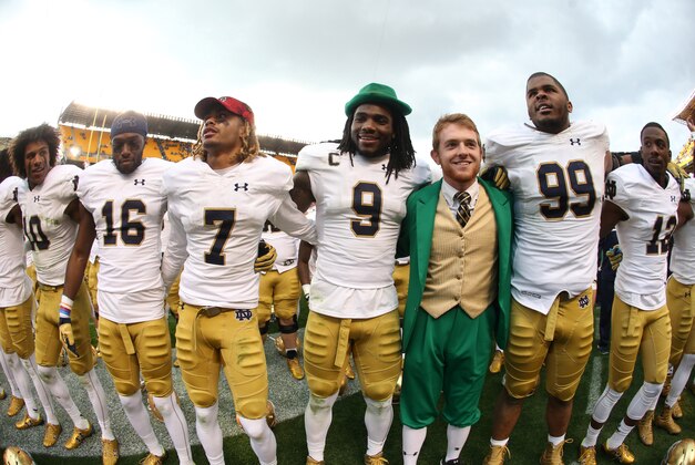 Nov 7, 2015; Pittsburgh, PA, USA; Notre Dame Fighting Irish players and mascot celebrate after defeating the Pittsburgh Panthers at Heinz Field. Notre Dame won 42-30. Mandatory Credit: Charles LeClaire-USA TODAY Sports