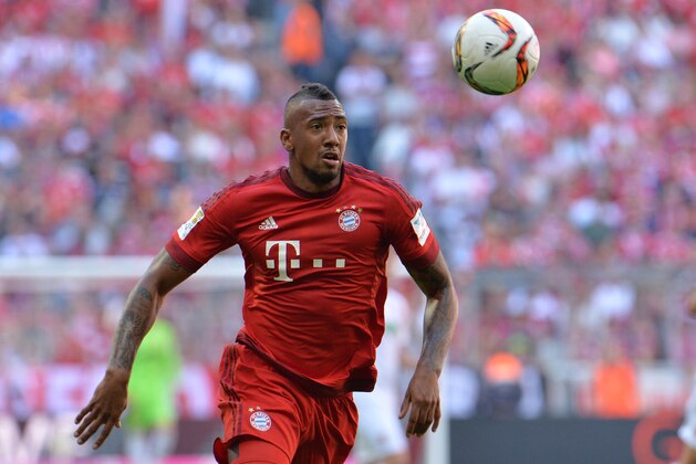 Munich's  Jerome Boateng plays the ball during the German Bundesliga soccer match between FC Bayern Munich and FC Augsburg in the Allianz Arena in Munich, Germany, on Saturday, September 12, 2015. (AP Photo/Kerstin Joensson)