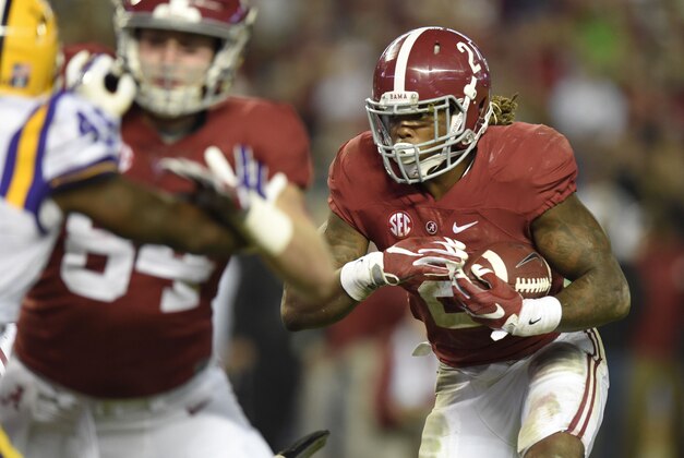 Nov 7, 2015; Tuscaloosa, AL, USA; Alabama Crimson Tide running back Derrick Henry (2) runs the ball for a touchdown during the third quarter against the LSU Tigers at Bryant-Denny Stadium. Mandatory Credit: John David Mercer-USA TODAY Sports