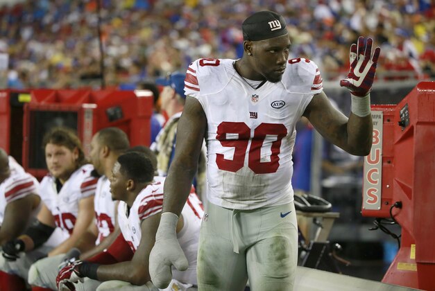Nov 8, 2015; Tampa, FL, USA; New York Giants defensive end Jason Pierre-Paul (90) waves to a fan during the second half against the Tampa Bay Buccaneers at Raymond James Stadium. New York Giants defeated the Tampa Bay Buccaneers 32-18. Mandatory Credit: Kim Klement-USA TODAY Sports